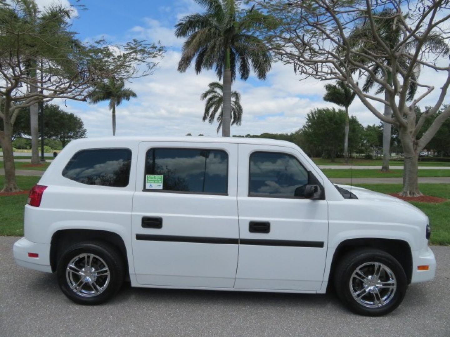 2012 White /Black with an 4.6L V8 engine, Automatic transmission, located at 4301 Oak Circle #19, Boca Raton, FL, 33431, (954) 561-2499, 26.388861, -80.084038 - You are looking at a Gorgeous 2012 Mobility Ventures MV1 Handicap Wheelchair Conversion Van with 64K Original Miles, 4.6L Ford V8, Bleack Leather Type Interior, Alloy Wheels, Power Side Entry Wheelchair Lift with Long Ramp and Short Ramp Function, Q Lock 150 EZ Lock, L-Track Tie Down System, Back Up - Photo#18